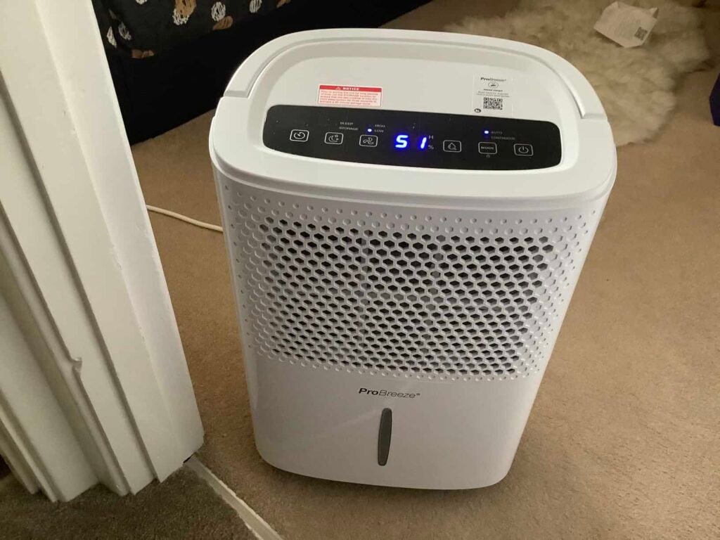 view of our own new purchase testing pro breeze 12l low energy dehumidifier energy efficient dehumidifier uk unboxing package arrival several weeks to months