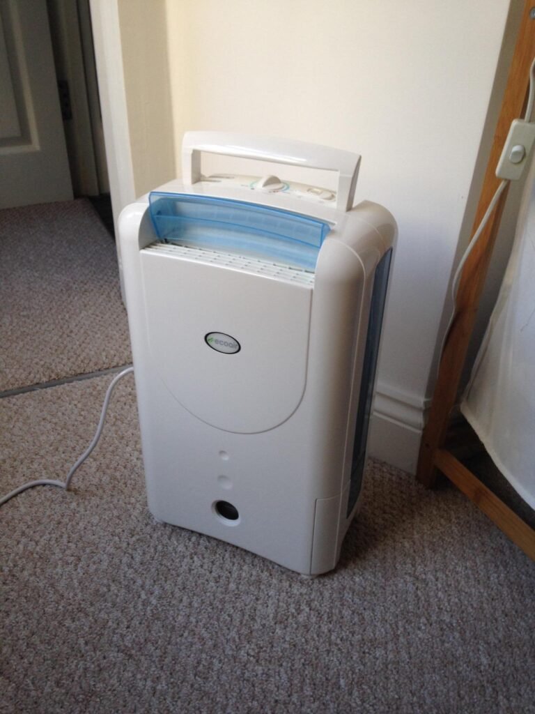 view of our own new purchase testing ecoair dd1 desiccant dehumidifier for drying clothes uk unboxing package arrival several weeks to months